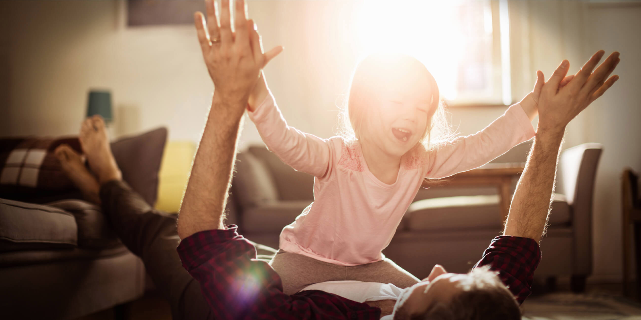 kid playing with father